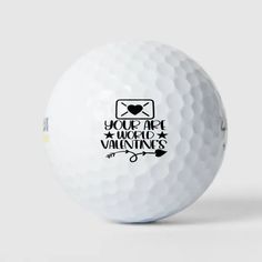 a white golf ball with the words you are magic valentine's written on it