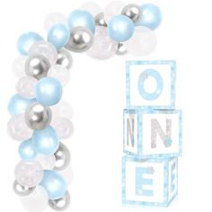 blue and silver balloons are arranged in the shape of an o'n e sign