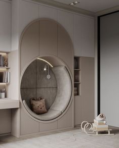 a circular mirror in the middle of a room with a chair and bookshelf