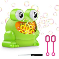 a green frog with bubbles and scissors next to it's mouth, on a white background