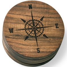 a wooden box with a compass on it