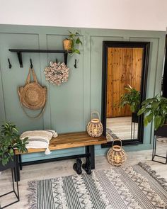 the entryway is decorated with plants and baskets