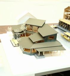 a model of a house on top of a table