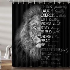 a black and white photo of a lion shower curtain with words written on the front