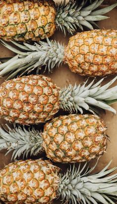 several pineapples sitting on top of each other