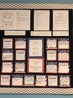 a bulletin board with several different types of papers attached to it and on the wall