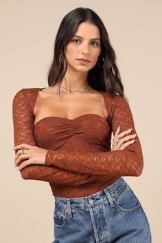 Your look will be so cute when you head out in the Lulus Curated Effect Rust Brown Lace Two-Piece Shrug Bodysuit! Sheer floral lace shapes this cute two-piece top that has a shrug-style overlay with long sleeves. Matching bodysuit has a strapless, sweetheart neckline with flattering ruching at the front and hidden no-slips strips. Attached thong bottoms have snap closures. Fit: This garment fits true to size. Length: Size medium Bust: Works best for A to C cup sizes - consider sizing up for full Brown Lace Top, Shrug Style, Lace Shrug, Strapless Bodysuit, Adhesive Bra, Cup Sizes, C Cup, Strapless Bra, Lace Tops