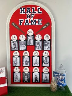 a baseball themed hall of fame board with pictures on the front and sides, surrounded by candy