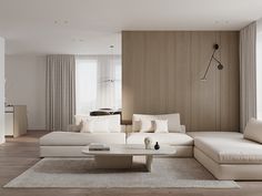 a living room filled with white furniture and large windows