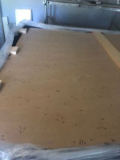 a large sheet of cardboard sitting on top of a table