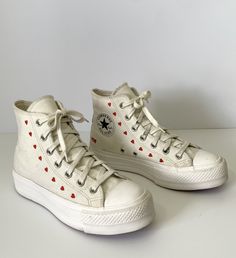 Converse Love Me Chuck Platform Lift High Top Embroidered Hearts Size 7.5  Overall in great condition. Pretty clean but there are a few marks/discoloration. Please see close up photos.  US Women's 7.5 Men's US 5.5 EUR 38 CM 24.5 UK 5.5 White with small red embroidered hearts Red Heart Converse, Embroidered Converse High Tops, Heart Converse, Embroidered Converse, Embroidered Hearts, Platform Converse, White Converse, Embroidered Heart, Birthday List