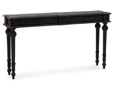 a black console table with two drawers on one side and an ornate design on the other