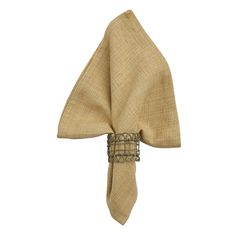 a tan napkin with a metal ring on it's side and a white background