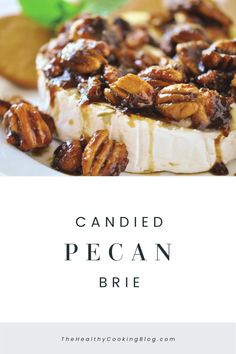 pecan brie on a white plate with the words candied pecan brie