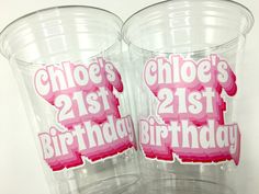 two plastic cups with pink stickers that say,'choles 21st birthday '