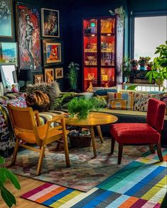 a living room filled with furniture and colorful rugs