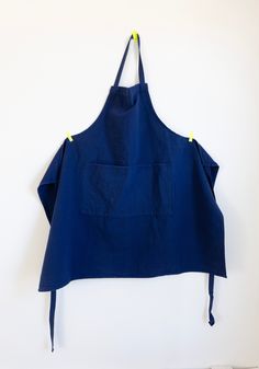 Apron in Cobalt is an essential for the kitchen. Made from high-end professional linen cotton blend in brilliant cobalt blue. Blending these two fibers creates a fabric that is soft and comfortable, but also strong and durable. It is highly absorbent, which makes it great for use in the kitchen. Features a large front pocket and adjustable tie back. Cotton is known for its softness, while linen is known for its durability. Blending these two fibers creates a fabric that is soft and comfortable, Kitchen Features, Tie Back, Christmas List, Cobalt Blue, Front Pocket, Blending, Cobalt, The Kitchen, Apron