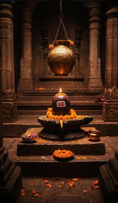 a candle is lit in the middle of a temple