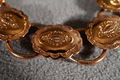 I am offering this fabulous vintage copper bracelet. This piece is truly gorgeous, and it has the following features: * beautiful vintage bracelet * oval * round links * etched design * locking closure * 7 inches in length This is a fantastic and classic piece. There is tons of sparkle and shine with this piece. It will beautifully complement your upcoming fashion season. Buyer pays all shipping and handling. 10/26 Vintage Copper Bracelet Jewelry, Vintage Copper Bracelet, Handmade Vintage Copper Bracelets, Vintage Copper Jewelry In Gold Color, Vintage Engraved Rose Gold Bracelet, Vintage Gold Bracelets With Copper, Vintage Gold Bracelets With Copper Material, Vintage Copper Bracelet Gift, Vintage Copper Bracelet As Gift