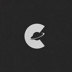 an image of the letter c on a black background with a white circle around it