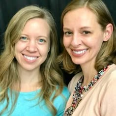 two women are smiling for the camera