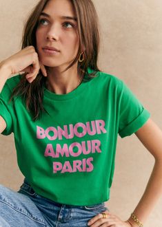 Short-sleeved organic cotton T-shirt;\"Bonjour Amour Paris\" print on front;Crew neck;Length from the shoulder: 60 cm / 23.6 in (for a S) Love Print T Shirt, Cotton Tshirt Women, Tshirt Tops For Women, All Over Print Tshirt Women, Love More Shirts, Paris Women Shirt, French Graphic Tee, Travel T Shirt, Printed T Shirts Ideas Women