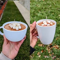 there is a person holding a cup with marshmallows in it on the outside