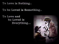 a man and woman standing next to each other in front of a black background with the words to love is nothing