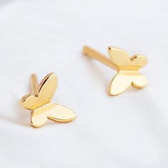 ✨ Add a Touch of Elegance with Our Dainty Gold Butterfly Stud Earrings ✨ 🌟 Attention: Looking for the perfect gift or a cute accessory to elevate your everyday look? These dainty gold butterfly stud earrings are just what you need! Handcrafted with precision and made from sterling silver, they are gold-plated for that luxurious touch you deserve. 💫 Interest: Whether you're dressing up for a special occasion or just adding a little sparkle to your casual wear, these earrings are lightweight, co Dainty Butterfly, Butterfly Stud Earrings, Friendship Jewelry, Butterfly Earrings Stud, Tiny Stud Earrings, Gold Butterfly, Butterfly Design, Earrings Sterling Silver, Sterling Silver Earrings Studs