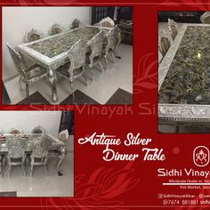 an ornate silver dinner table with chairs