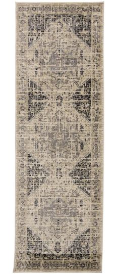 a rug with an abstract design in grey and beige colors on the bottom half of it