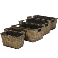 three woven baskets with handles on each side