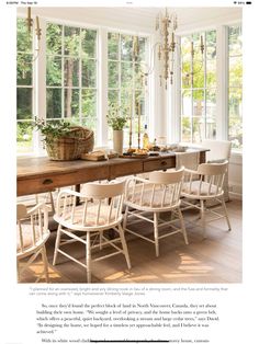 an image of a dining room with chairs and table in the foreground, window to the right