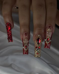 Red and gold prom freestyleeee Book your next nail appt today! @bratcrylix - Not able to book? Order your next custom made press on set @bratcrylix with the order form in my bio! Check "press ons" highlight for more info🤗 - #atlnails #atlnailtech #atlnailsalon #atlantanails #atlantanailsalon #atlantanailtech #cummingganails #cummingganailsalon #cummingnails #cummingnailtech #alpharettanails #alpharettanailtech Nails For Quinceanera Red, Red Nail Designs For Quince, Red And White Nails With Rhinestones, Red Quince Nails Almond, Red And Gold Prom Makeup, Red Nails Ideas Quince, Red And Gold Bling Nails, Acrylic Nails Xmas