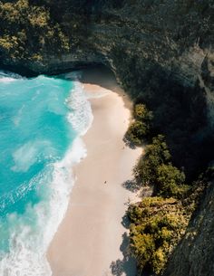 an aerial view of the beach and cliffs