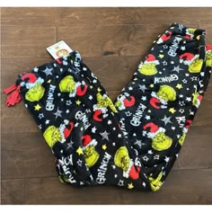 dr seuss the cat in the hat pajama pants on a wooden floor