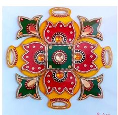 an intricately designed wall hanging with beads