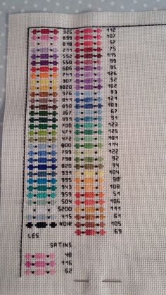 a cross stitch pattern with different colors and numbers on the bottom half of each sample