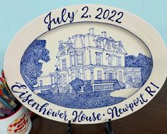 a blue and white plate sitting on top of a table