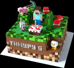 an image of a cake made to look like a minecraft farm scene with animals and people