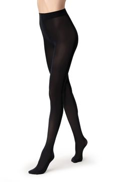 Enjoy a bit of extra warmth in chilly settings wearing these stretchy tights that are soft to the touch. 65% lyocell, 30% polyamide, 5% elastane Hand wash, dry flat Made in Italy Classic Parisian Style, Paris Outfit Ideas, French Wardrobe, Parisian Look, Parisian Women, Europe Outfits, French Girl Style, Chanel Inspired, Effortless Hairstyles