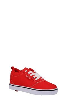 They can walk or roll in this superfun sneaker that features a durable canvas upper and a wheel-embedded heel for speedy style. Lace-up style Removable, cushioned insole with arch support Textile upper and lining/rubber sole Imported Heelys Roller Shoes, Unisex Shoes Sneakers, Roller Shoes, Up Styles, Arch Support, Big Kids, Rubber Sole, Red White, Red And White