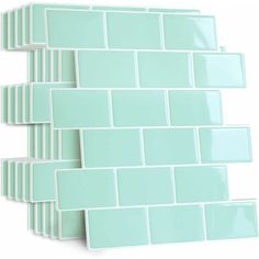 three rows of light green glass tiles on a white background