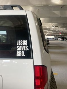 there is a sticker on the back of a white car that says jesus saves bro