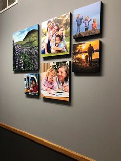 a wall with many pictures hanging on it