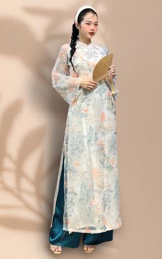 📌HANDMADE item  At EmTam Boutique, you will find the most stylish outfits in a wide size range and high quality at reasonable prices    📌 MESSAGE us if you're not sure of your ASIAN AODAI SIZE   Please LOOK AT THE SIZE CHART CAREFULLY BEFORE ORDERING   📌 This set includes 1 ao dai top & pants, perfect for any special occasions like lunar New year, mid-autumn festival, wedding, temple, church or photoshoot...   📌 There might be up to 10% color variance due to lightning and viewing devices    📌 The measurements of this aodai (ao dai) is in Vietnamese size which runs small so please go up 1 size or contact us if there's any question. US standard sizes tend to be bigger for same size. Please refer to the sizing charts for sizing.   📌 We support exchange for sizing inaccuracy. Please cont Traditional White Ao Dai For Festive Occasions, Spring Wedding Embroidered Ao Dai, Summer Wedding Ao Dai With Long Sleeves, White Embroidered Ao Dai For Spring, Embroidered White Ao Dai For Spring, Long Ao Dai With Floral Embroidery For Spring, Festive White Embroidered Ao Dai, Festive Long Sleeve Ao Dai With Floral Embroidery, Summer Ao Dai With Floral Embroidery And Long Sleeves