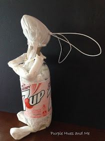 a plastic bag that has been wrapped in white paper and is sitting on a table