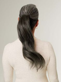 An off black base with light gray strands, this neutral-toned salt and pepper shade lets you get back to your roots. Excerpt Length: 20" inches video Clip-in Ponytails Another reason to love second day hair Watch The Video https://vimeo.com/407978657 faq how-do-i-choose-the-right-color-gray-extensions What-is-the-luxy-hair-ponytail-extension What-is-the-benefit-of-the-luxy-hair-ponytail-extension What-does-the-luxy-hair-ponytail-extension-come-with Does-the-luxy-hair-ponytail-extension-come-with Grey Hair Ponytail, Pepper Hair, Wrap Around Ponytail, Clip In Ponytail Extensions, Ponytail Hair Piece, Blonde Ponytail, Salt And Pepper Hair, Second Day Hairstyles, Luxy Hair