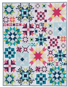 a colorful quilt with many different designs on the front and back, all in various colors