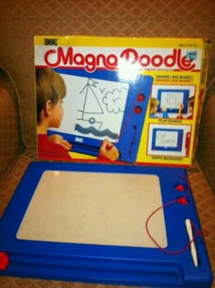 a kid's drawing tablet with instructions on the back and in front, sitting on a chair